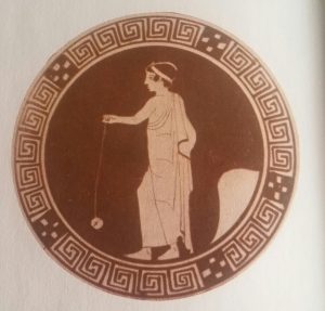 Yoyó en cerámica griega juguete acrobacias mano